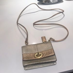 Gold cross body Coach mini